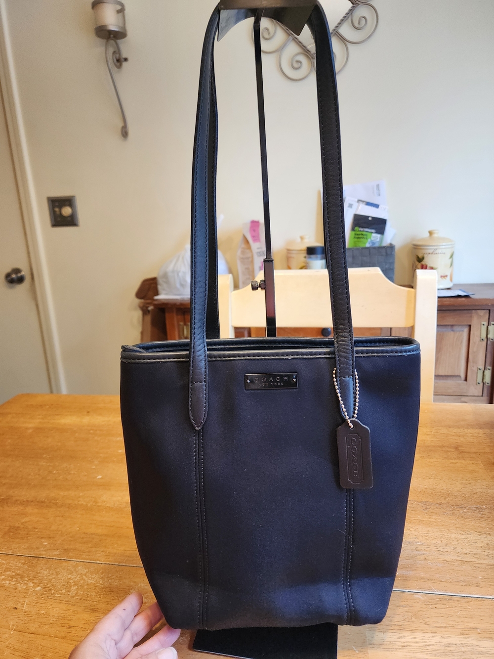 vintage 1999 Coach Neo Tote crafted in black neoprene with leather trim